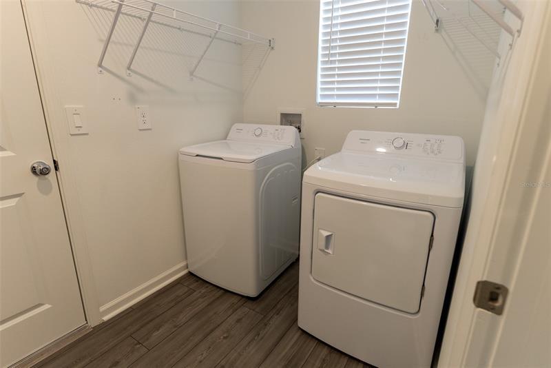 Laundry room with washer and dryer included